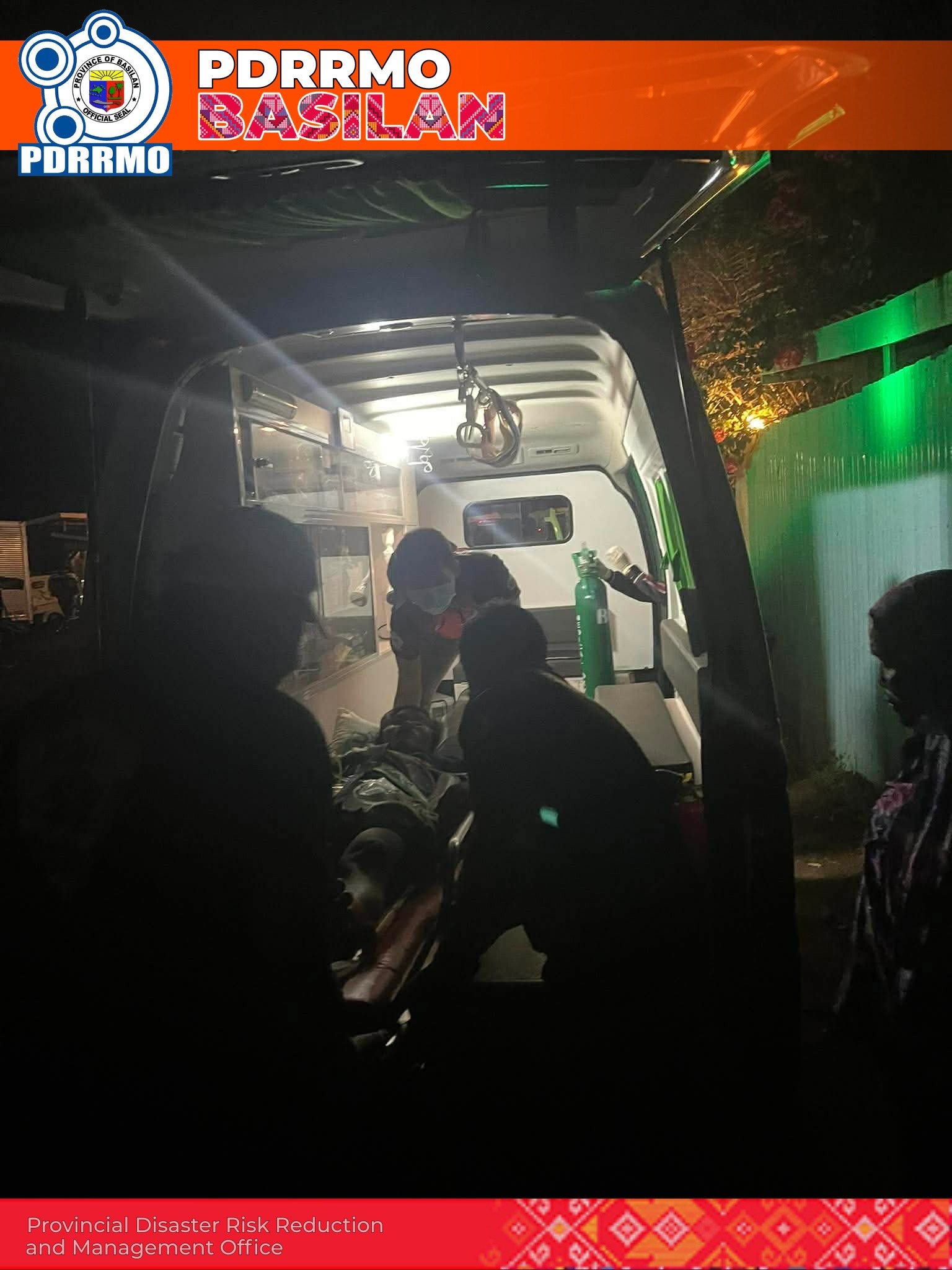 EMS personnel provide immediate medical attention during emergency transport.